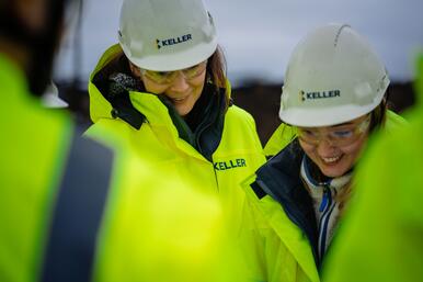 Two female Keller employees wearing ppe