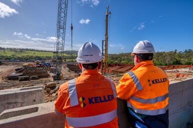 Two male employees look over site in Keller Australia