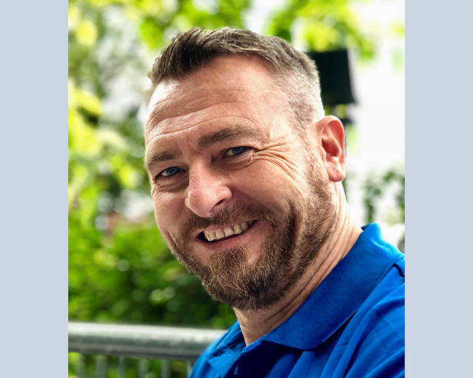 male smiling headshot