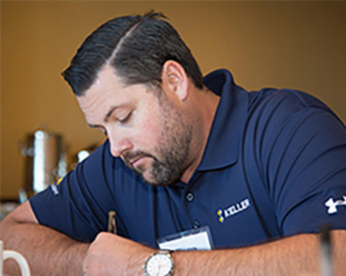 keller employee writing