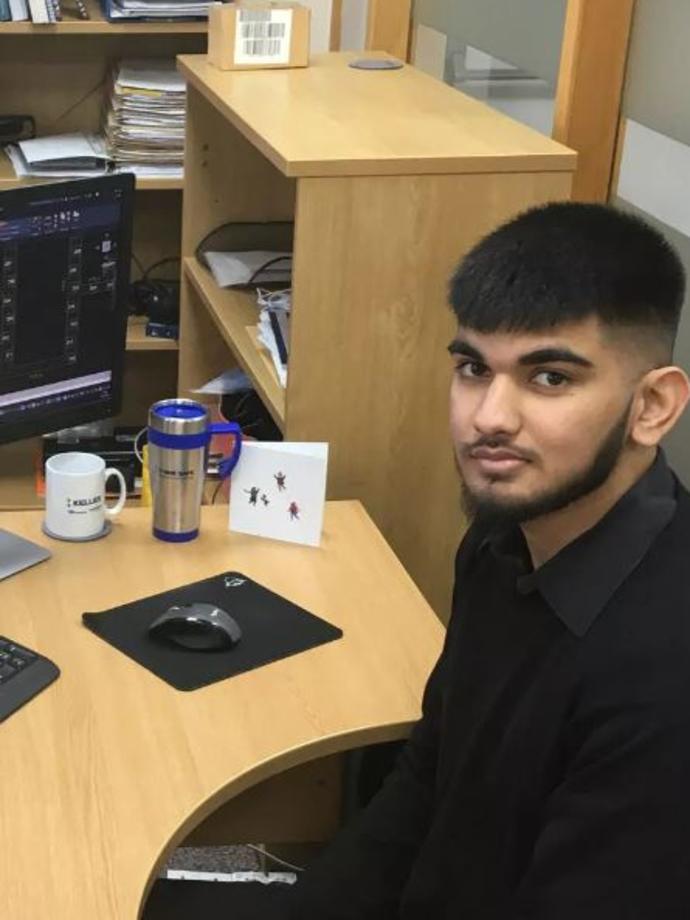 Ishan Singh at his computer