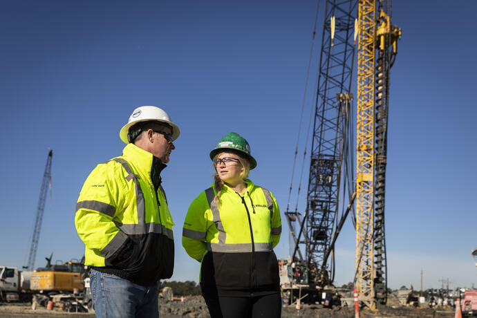 male and female keller north america employees on site