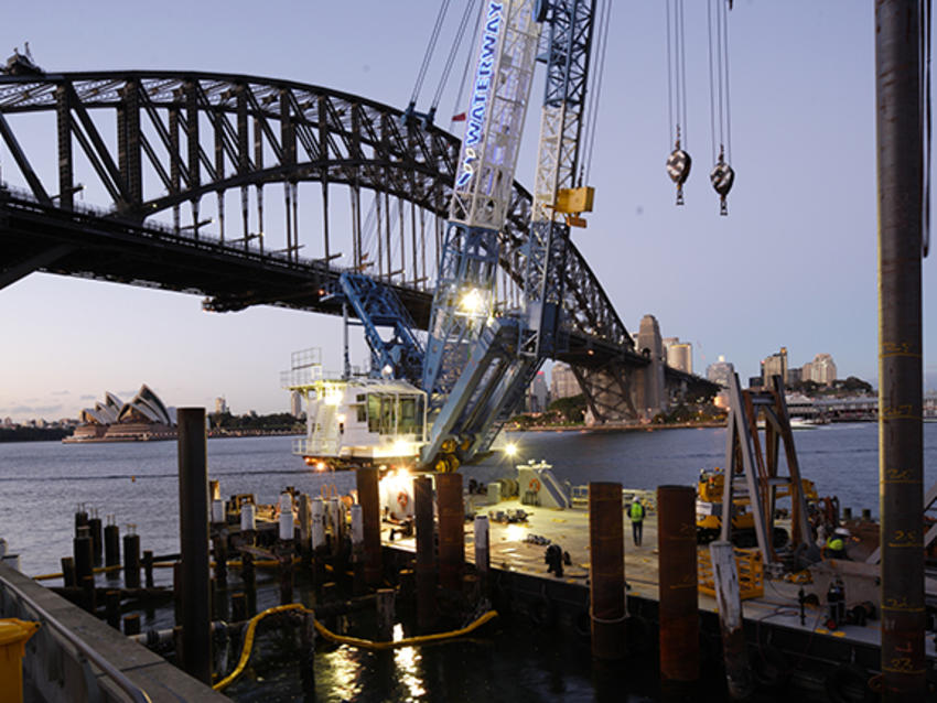 rig working in front of sydney harbour bridge and opera house