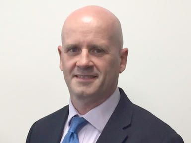 male employee in suit and tie