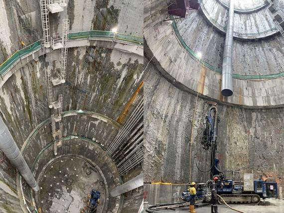 Keller employees working at the bottom of a sewerage system shaft