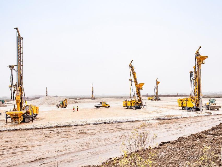 yellow Keller rigs spread out over construction site